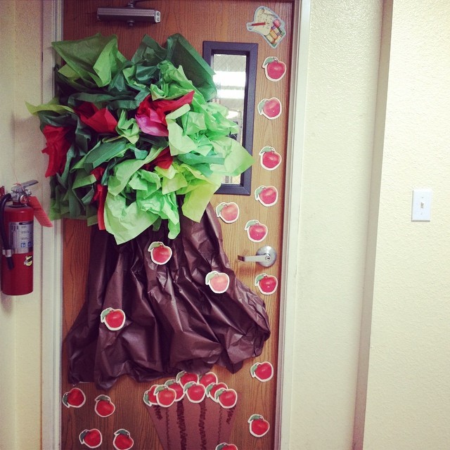 Classroom door decorated as an apple tree to welcome families