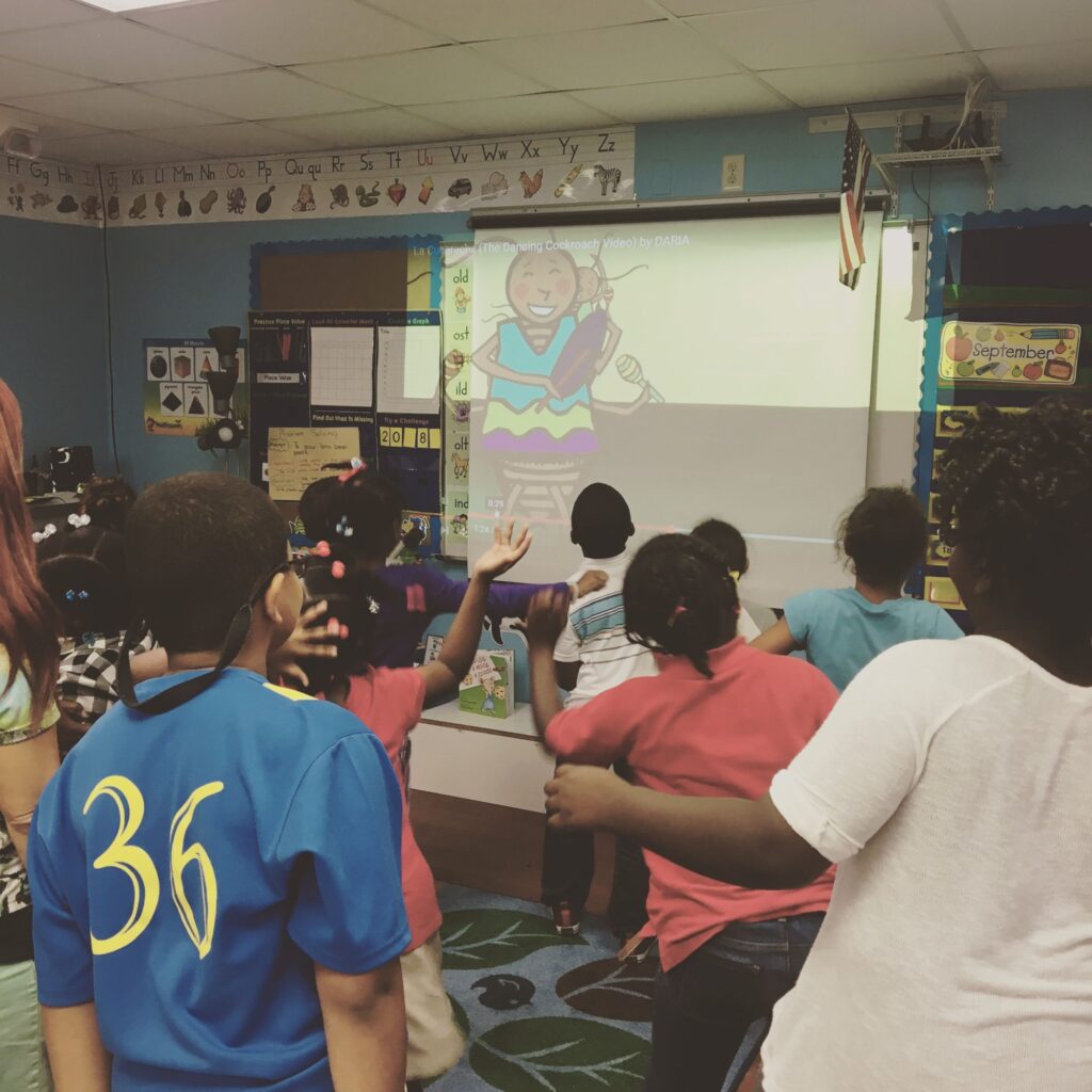 Elementary students doing a dance brain break in the classroom
